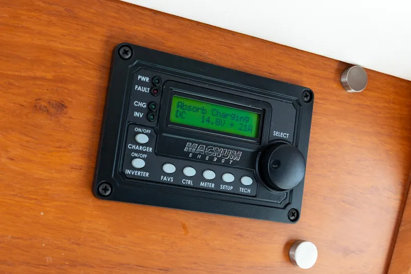 Slide: The Image of Control panel on 2010 North Pacific 39 Pilothouse displaying charging status. - 13