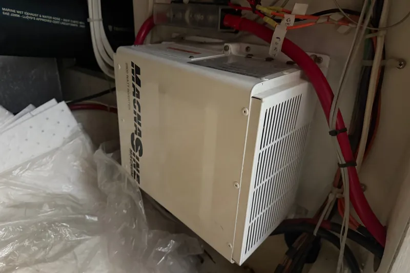 Slide: The Image of Electrical system inside a 2000 Bayliner 3988 Command Bridge Motoryacht, featuring a Magnum inverter. - 45