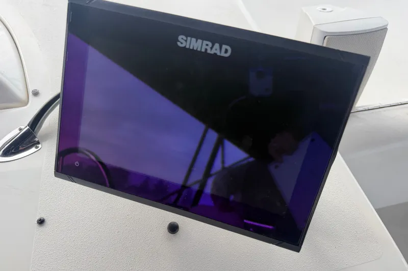 Slide: The Image of Simrad display on 2000 Bayliner 3988 Command Bridge Motoryacht dashboard. - 36