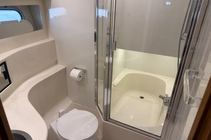 Slide: The Image of Bathroom interior of 2000 Bayliner 3988 Command Bridge Motoryacht with shower and toilet. - 25