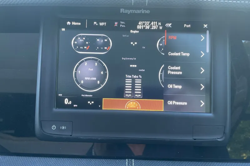 Slide: The Image of Raymarine display on 2015 Sea Ray SLX 350 showing navigation and engine data. - 15