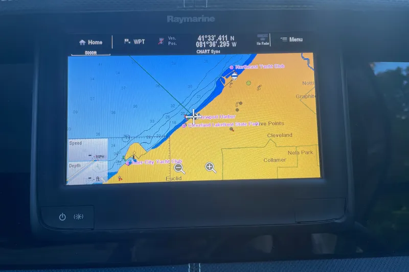 Slide: The Image of Raymarine navigation display on 2015 Sea Ray SLX 350, showing coastal map and waypoints. - 16