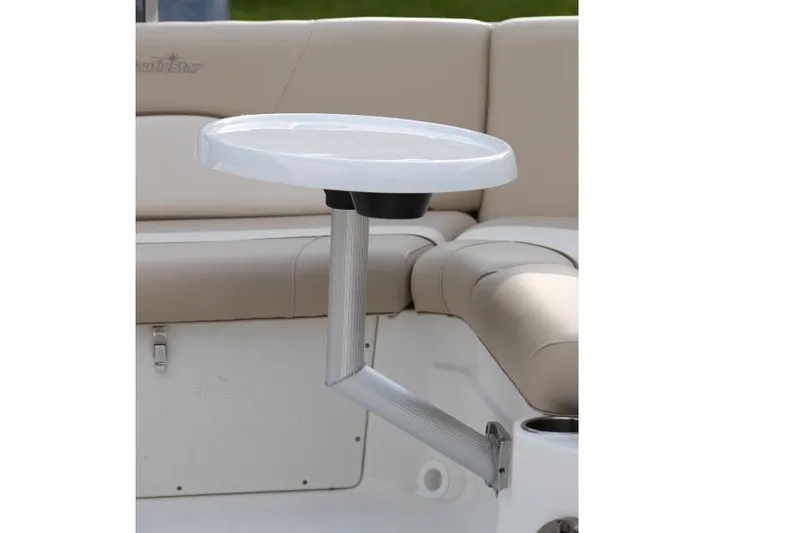 Slide: The Image of Manufacturer Provided Image: 2021 NauticStar 223 DC boat interior with a mounted table. - 3