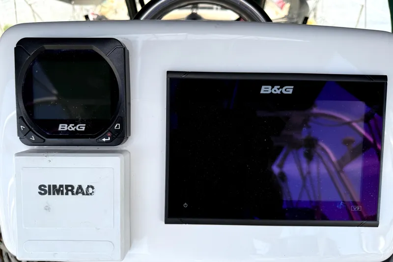 Slide: The Image of B&G and Simrad navigation equipment on a 1979 Tayana 37 yacht dashboard. - 27