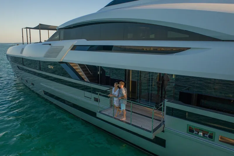 Slide: The Image of Luxury Rossinavi Vector 50m yacht, 2020 model, with couple enjoying ocean view. - 32