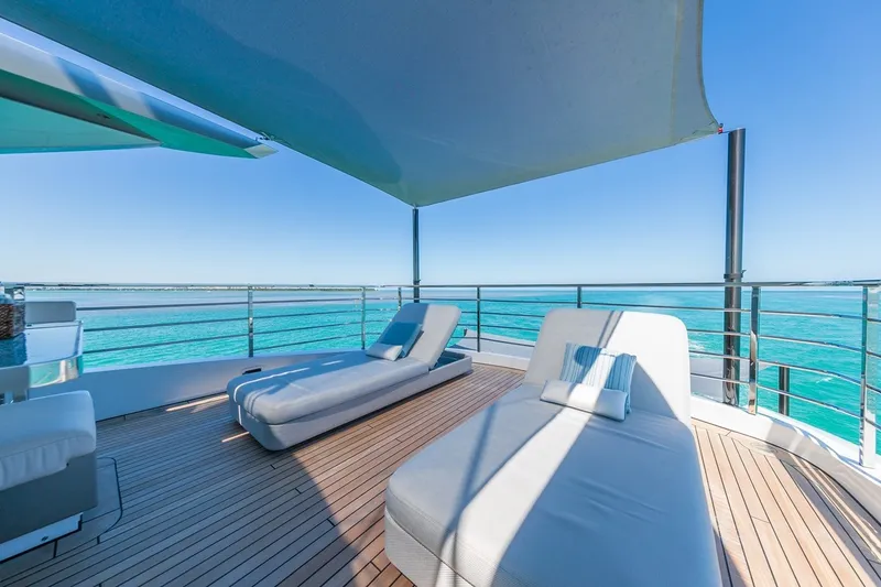 Slide: The Image of Luxurious deck of 2020 Rossinavi Vector 50m yacht with sun loungers and ocean view. - 38