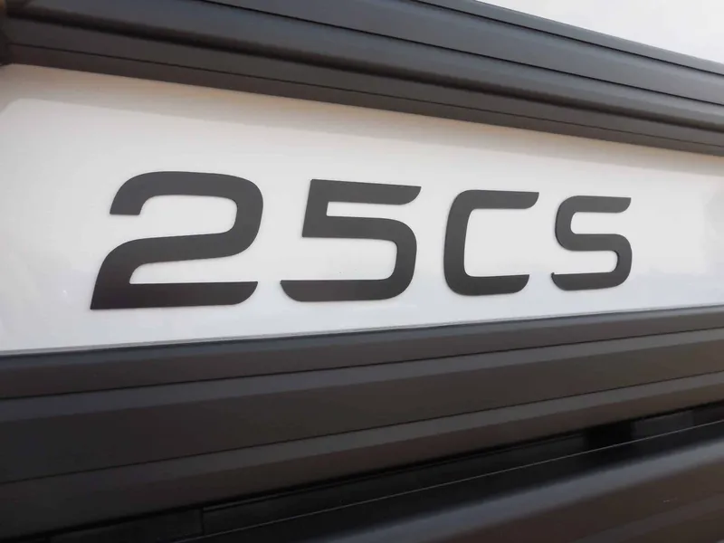Slide: The Image of Close-up of the '25CS' lettering on a boat. - 20