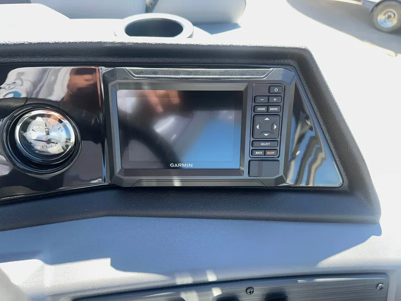 Slide: The Image of The image shows a Garmin navigation system on a Bennington 22 SSR boat. - 6