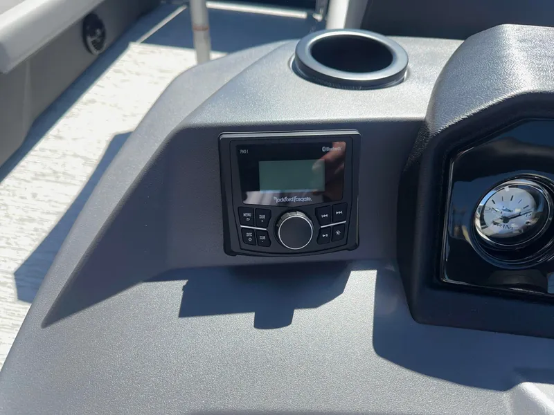 Slide: The Image of Close-up of a modern helm with a Hydrotouch control panel and a cup holder. - 7