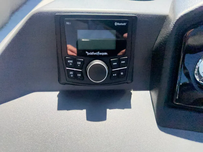 Slide: The Image of The image shows a Rockford Fosgate Bluetooth audio system on a boat. - 7
