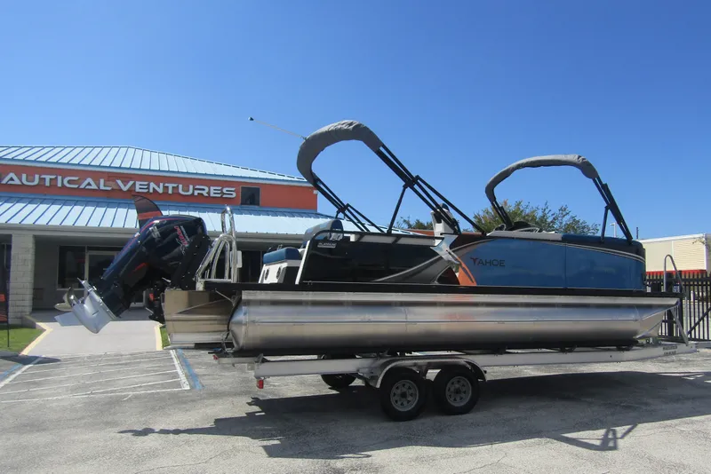 The Image of 2026 Tahoe Pontoon LTZ Cruise Rear Bench 23 on trailer at Nautical Ventures. - 0