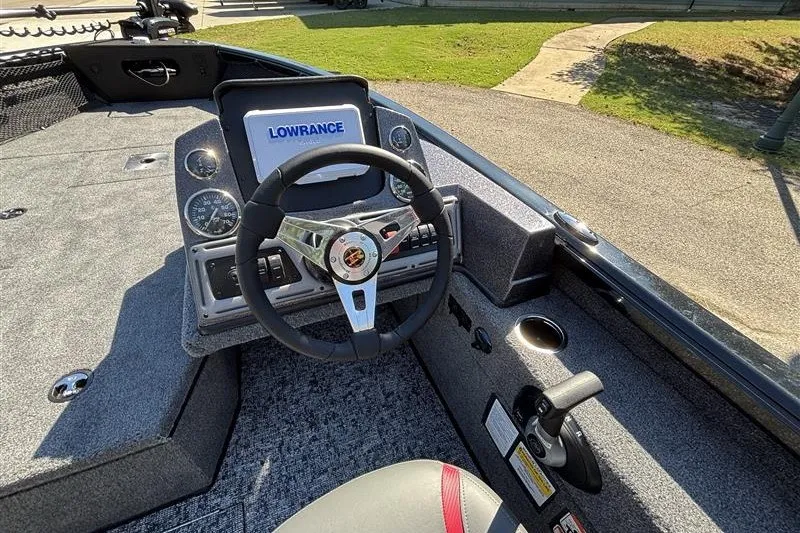 Slide: The Image of 2026 Ranger VS1882SC Angler boat cockpit with steering wheel and Lowrance display. - 27