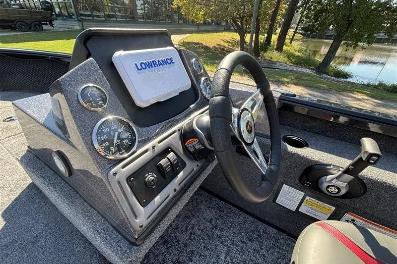 Slide: The Image of 2026 Ranger VS1882SC Angler boat dashboard with Lowrance display and steering wheel. - 28
