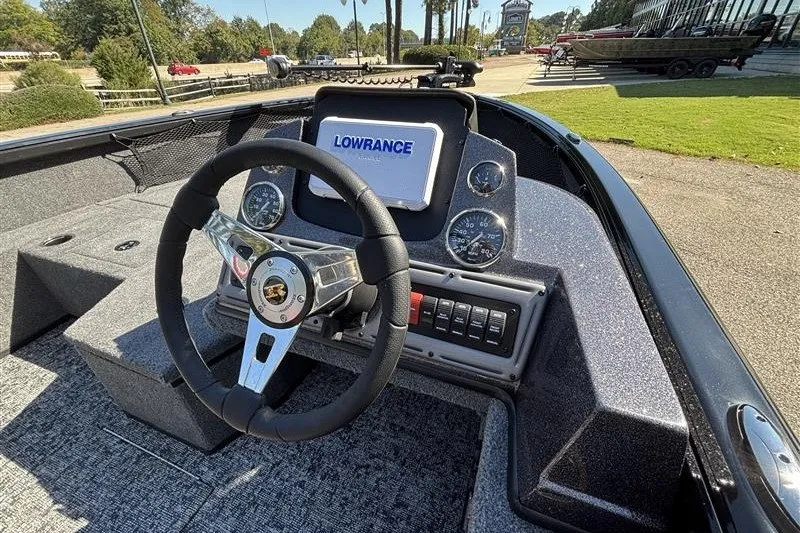 Slide: The Image of 2026 Ranger VS1882SC Angler boat dashboard with steering wheel and Lowrance navigation system. - 29