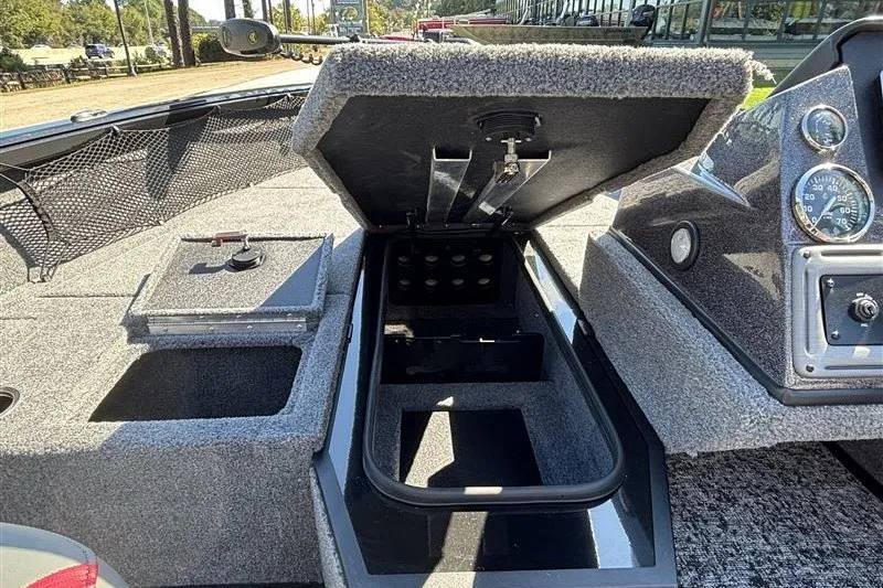 Slide: The Image of 2026 Ranger VS1882SC Angler boat interior storage compartments and dashboard details. - 22