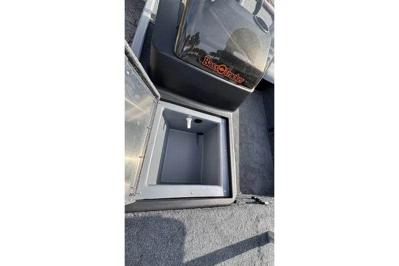 Slide: The Image of Open storage compartment in 2027 Tracker Bass Tracker Classic Limited boat. - 15