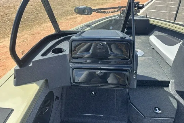 Slide: The Image of Interior view of 2027 Tracker Targa V-18 Combo boat, featuring dashboard and seating area. - 13