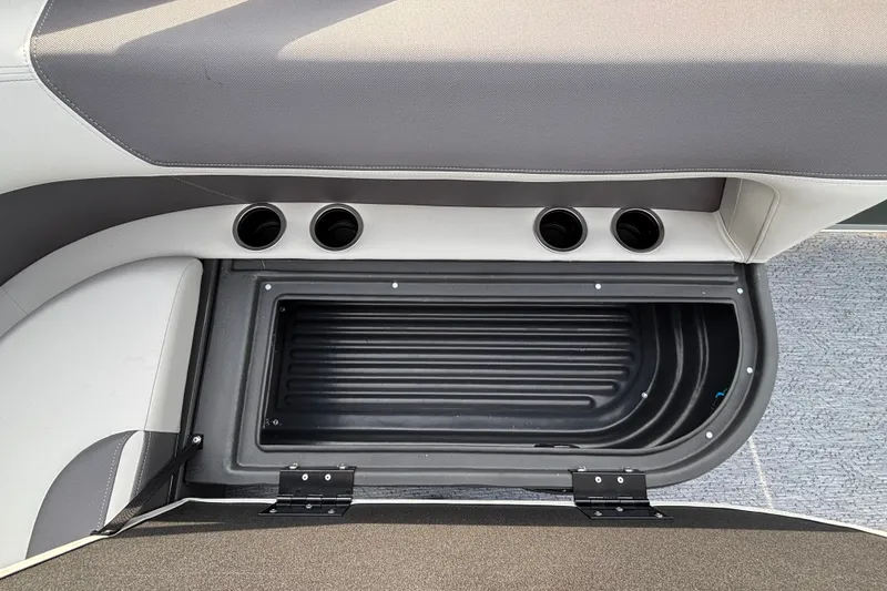 Slide: The Image of Interior storage compartment of 2027 Sun Tracker Bass Buggy 16 XL Select boat. - 14