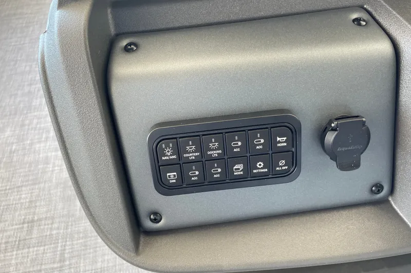 Slide: The Image of Control panel of 2027 Sun Tracker Party Barge 22 DLX with various switches and USB port. - 31