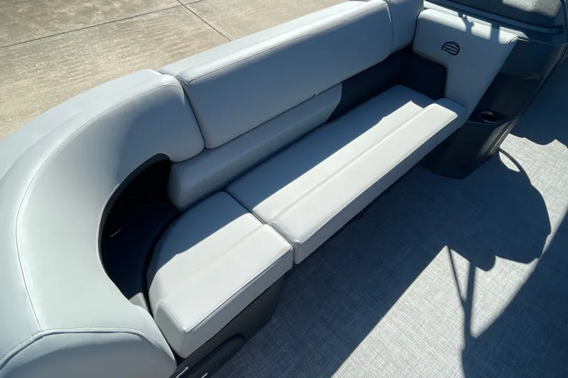 Slide: The Image of 2027 Sun Tracker Party Barge 22 DLX with sleek gray seating on deck. - 25