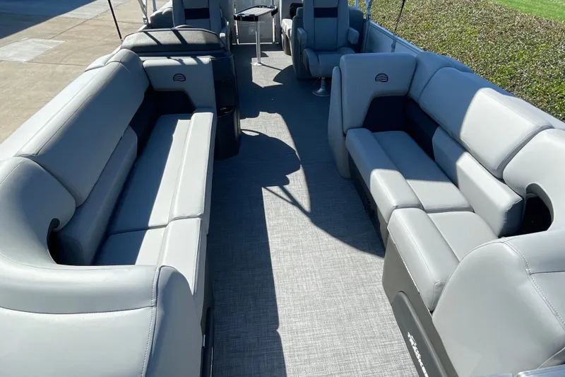 Slide: The Image of 2027 Sun Tracker Party Barge 22 DLX interior with spacious seating and modern design. - 24