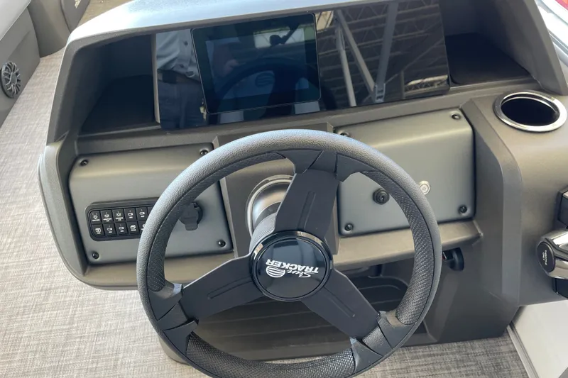 Slide: The Image of Steering console of 2027 Sun Tracker Party Barge 22 DLX pontoon boat. - 30