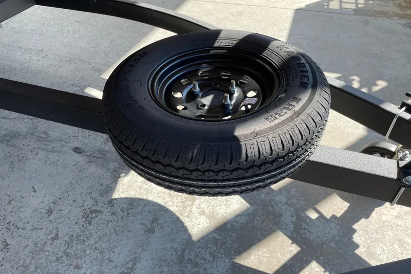 Slide: The Image of Spare tire mounted on a Sun Tracker Party Barge 22 DLX trailer, 2027 model. - 50