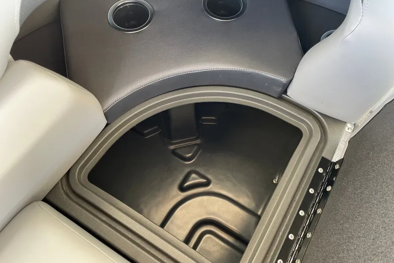 Slide: The Image of Storage compartment in 2027 Sun Tracker Party Barge 22 DLX with cup holders. - 45