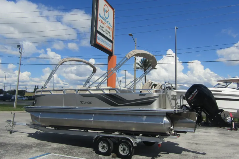 Slide: The Image of 2026 Tahoe Pontoon Sport 85 Rear Fish 21 on trailer at dealership. - 1