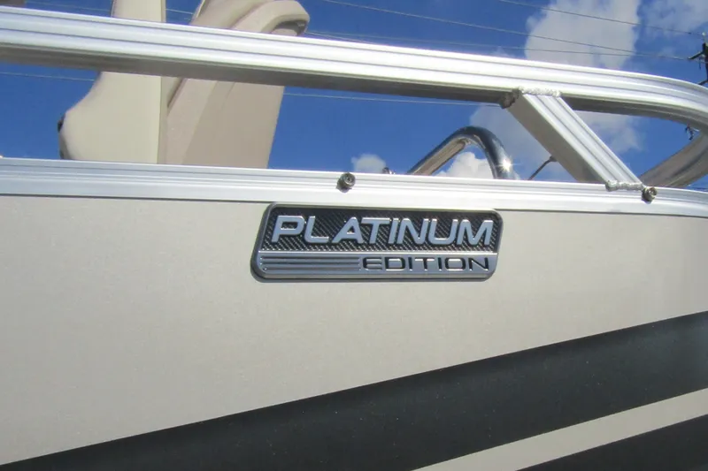 Slide: The Image of 2026 Tahoe Pontoon Sport 85 Rear Fish 21, Platinum Edition badge detail. - 8