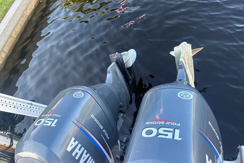 Slide: The Image of Twin Yamaha 150 outboard motors on a 2010 Key West 244 Center Console boat. - 29