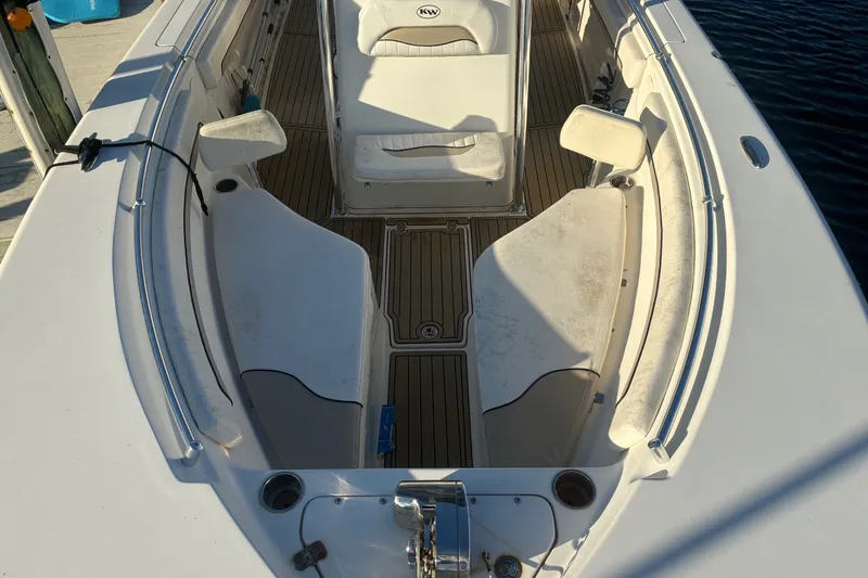 Slide: The Image of 2010 Key West 244 Center Console boat interior with seating and deck details. - 3