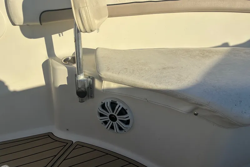 Slide: The Image of Interior of 2010 Key West 244 Center Console boat with seating and speaker. - 5