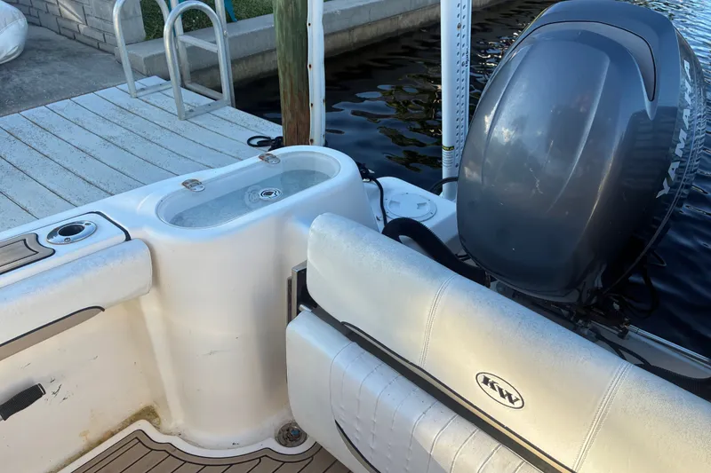 Slide: The Image of 2010 Key West 244 Center Console boat with Yamaha engine at dock. - 32
