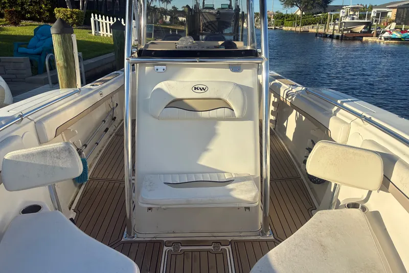 Slide: The Image of 2010 Key West 244 Center Console boat interior with seating and water view. - 12