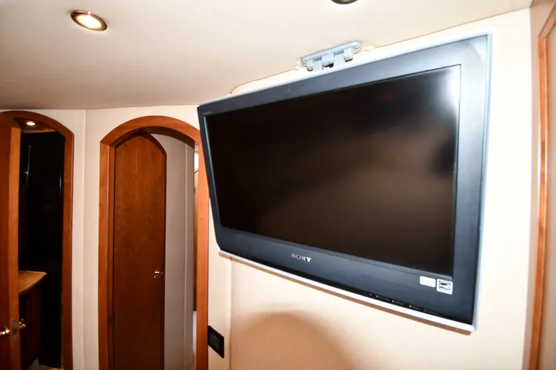 Slide: The Image of Sony TV mounted in 2003 Cruisers Yachts 5000 Sedan Sport interior. - 42