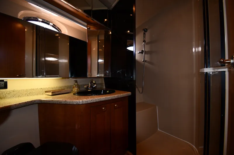 Slide: The Image of Luxurious bathroom interior of 2003 Cruisers Yachts 5000 Sedan Sport. - 52
