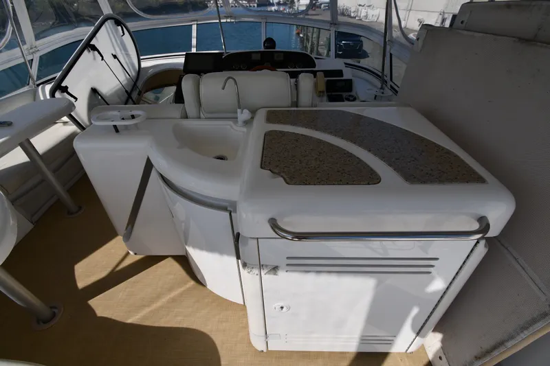 Slide: The Image of 2003 Cruisers Yachts 5000 Sedan Sport interior with sink and countertop. - 31