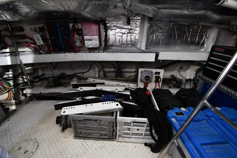 Slide: The Image of Engine room of 2003 Cruisers Yachts 5000 Sedan Sport with equipment and wiring. - 86