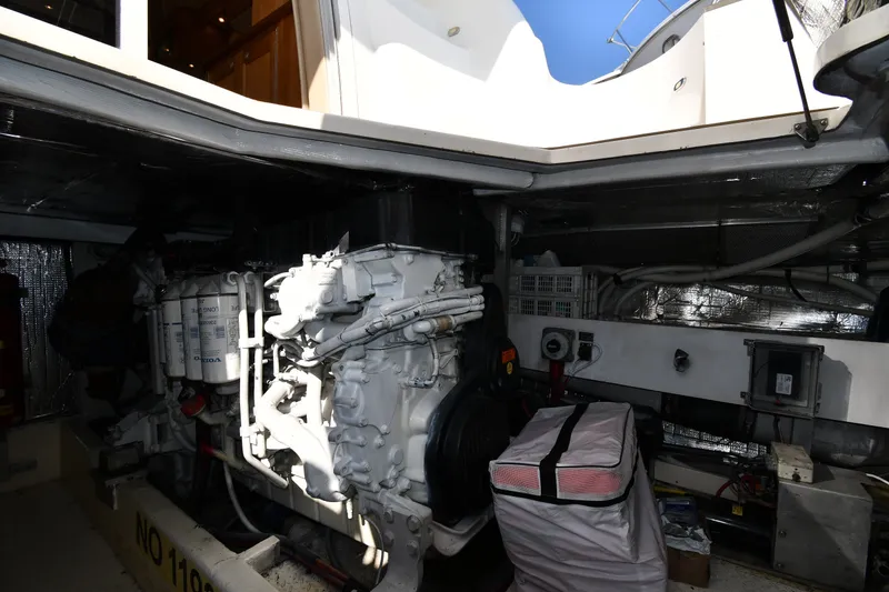 Slide: The Image of Engine room of 2003 Cruisers Yachts 5000 Sedan Sport, showcasing mechanical components. - 80