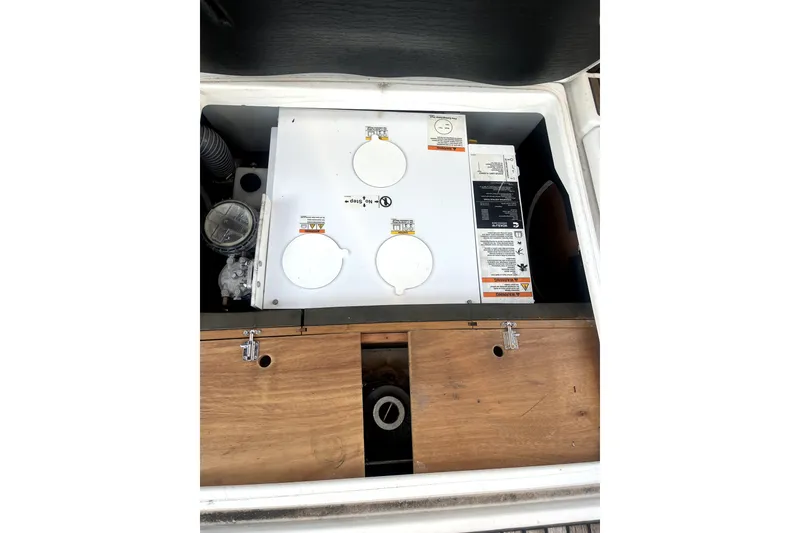 Slide: The Image of Engine compartment of 2016 Jeanneau Sun Odyssey 469 sailboat, showcasing mechanical components. - 20