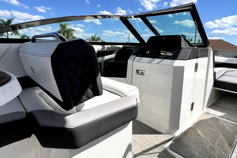 Slide: The Image of 2022 Cobalt R6 Outboard boat interior with sleek seating and modern design. - 96