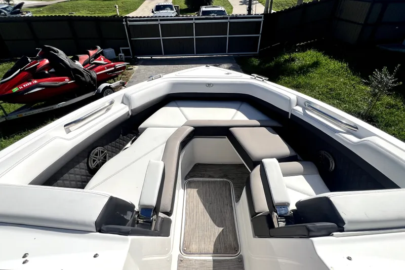 Slide: The Image of 2022 Cobalt R6 Outboard boat interior with plush seating and modern design. - 83