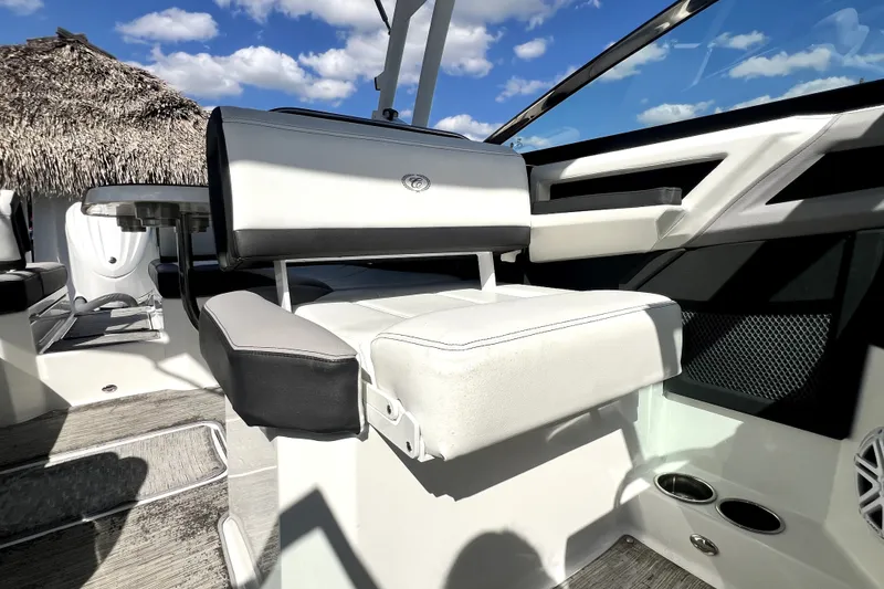 Slide: The Image of 2022 Cobalt R6 Outboard boat interior with white seating and modern design. - 73