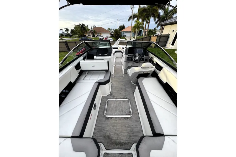Slide: The Image of 2022 Cobalt R6 Outboard boat interior with sleek seating and modern dashboard design. - 6