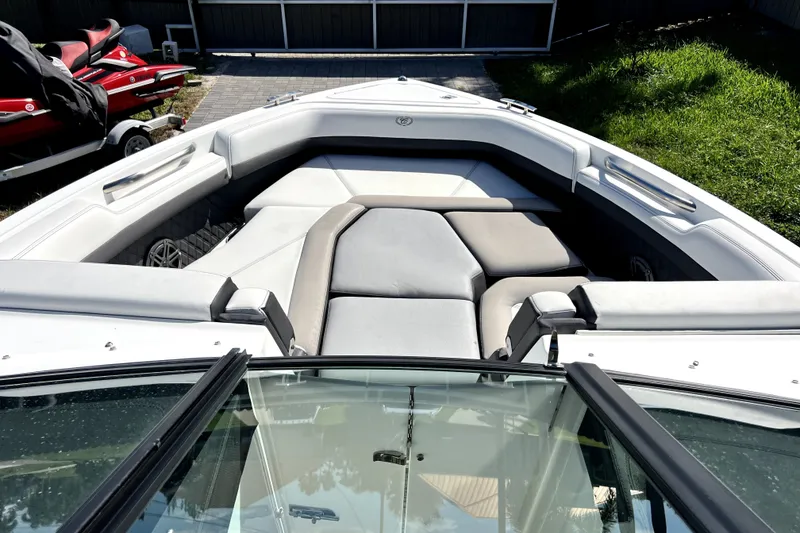 Slide: The Image of 2022 Cobalt R6 Outboard boat interior with cushioned seating and sleek design. - 50