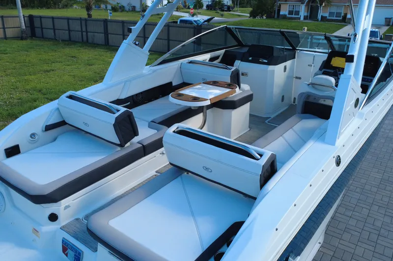 Slide: The Image of 2022 Cobalt R6 Outboard boat interior with luxurious seating and sleek design. - 21