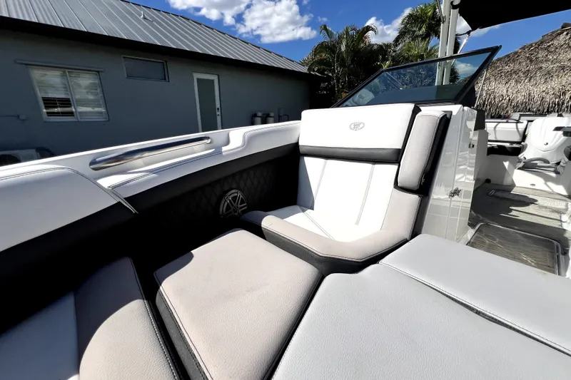 Slide: The Image of 2022 Cobalt R6 Outboard boat interior with luxurious seating and modern design. - 85