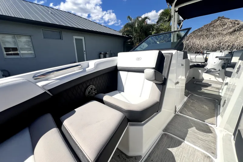 Slide: The Image of 2022 Cobalt R6 Outboard boat interior with luxurious seating and modern design. - 79