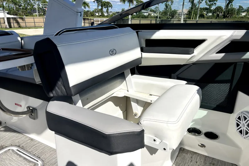 Slide: The Image of Interior of 2022 Cobalt R6 Outboard boat with white seating and modern design. - 70